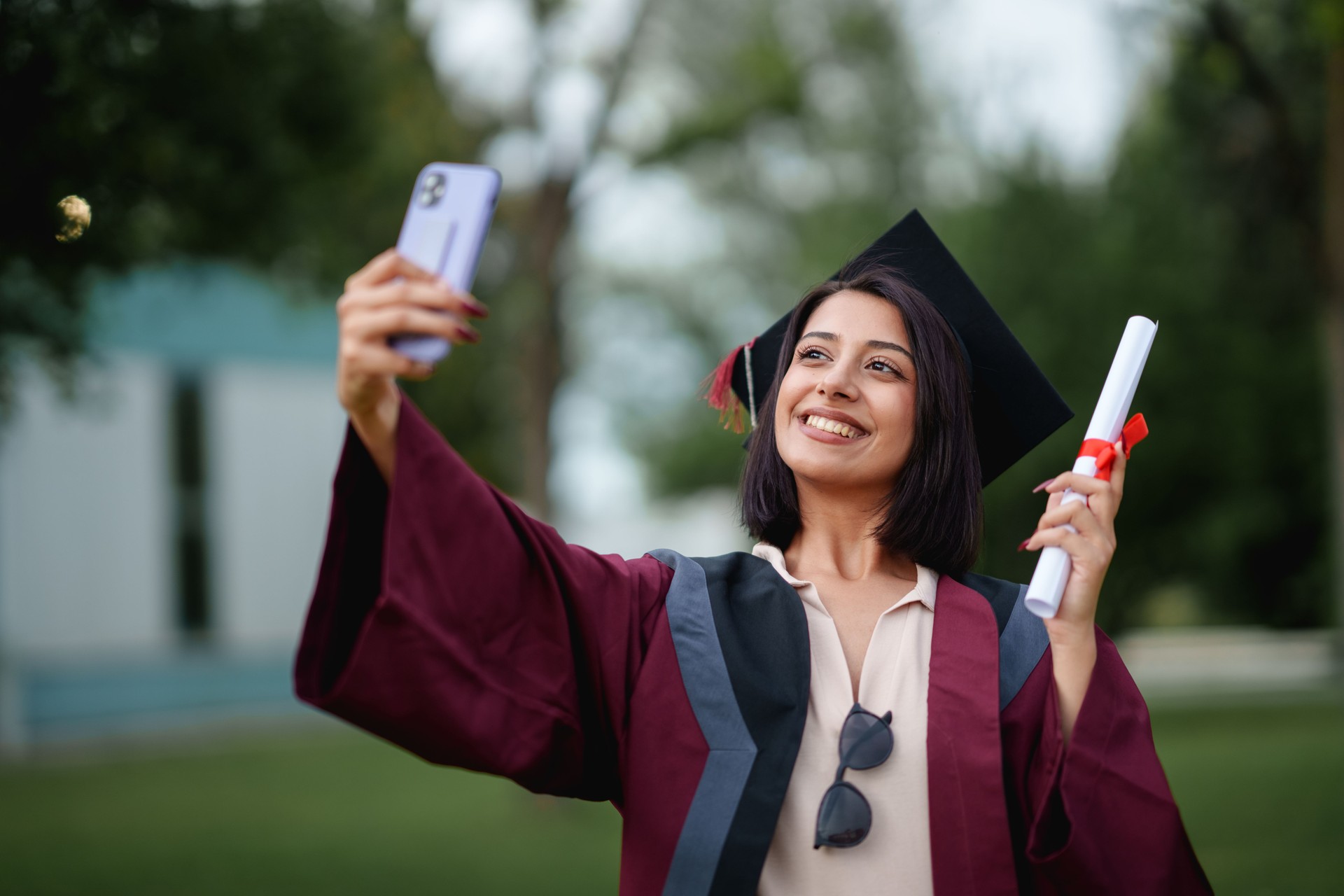 Portraits of college graduate students on graduation day.